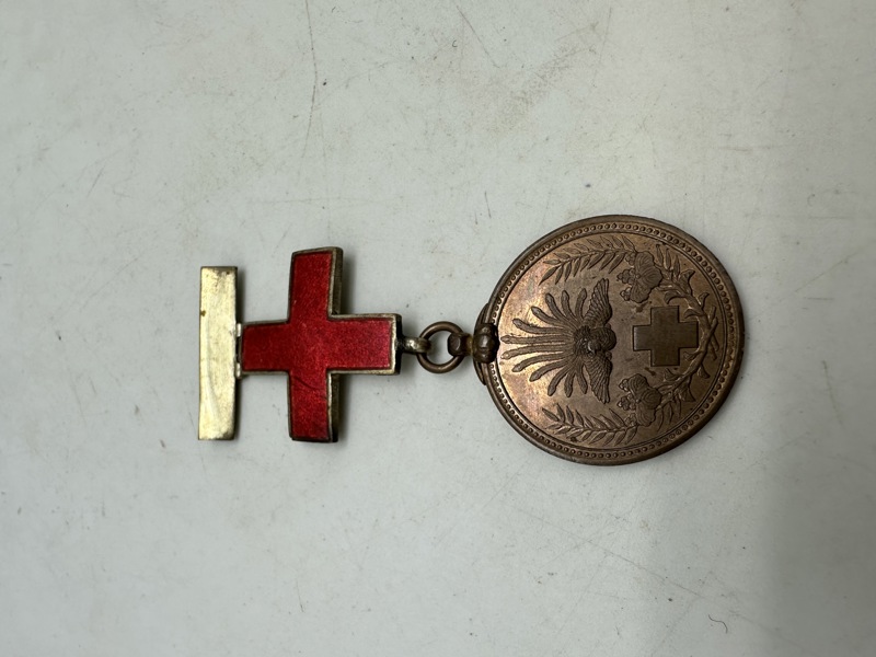 Japan: Red Cross medal for the Russo Japanese War 1904-5 bronze with large enamelled red cross suspension for Medical staff