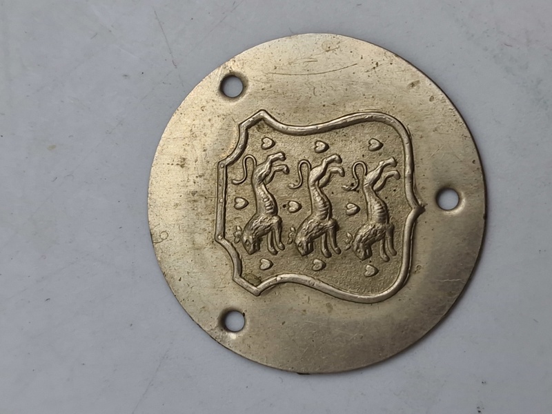 Originalt skjold for modstandsbevægelsens armbind
