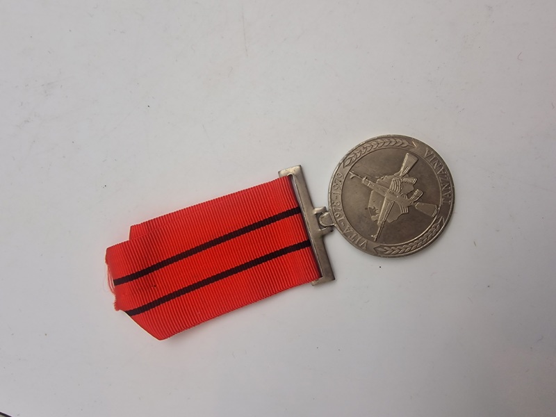 Original tanzanisk medalje tildelt for deltagelse i Uganda-Tanzania-krigen, også kendt som Kagera-krigen i Tanzania eller Befrielseskrig i Uganda.