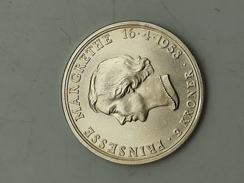 dansk 2-kronemønt fra 1958, udstedt i anledning af Prinsesse Margrethes (nu Dronning Margrethe II) 18-års fødselsdag. 