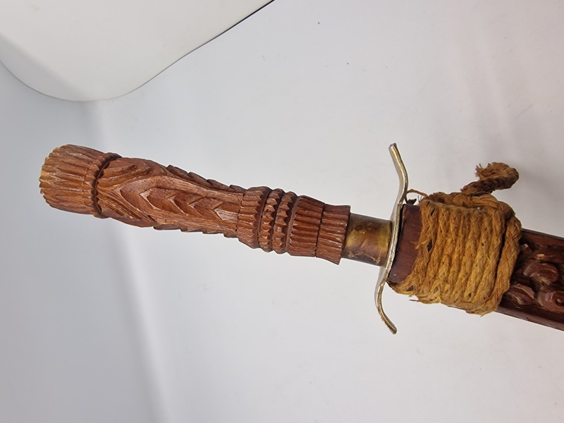 Ornate Indonesian Sword with Hand Carved Wooden Sheath