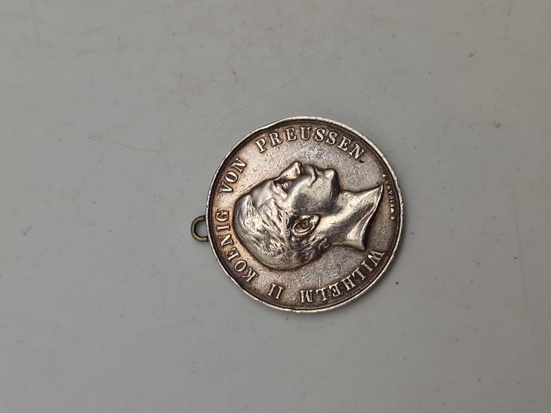 Original sølv medalje med teksten “Dem Besten Schützen”
