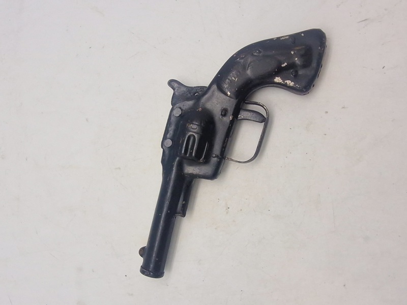 Helstøbt antik legetøjs revolver 