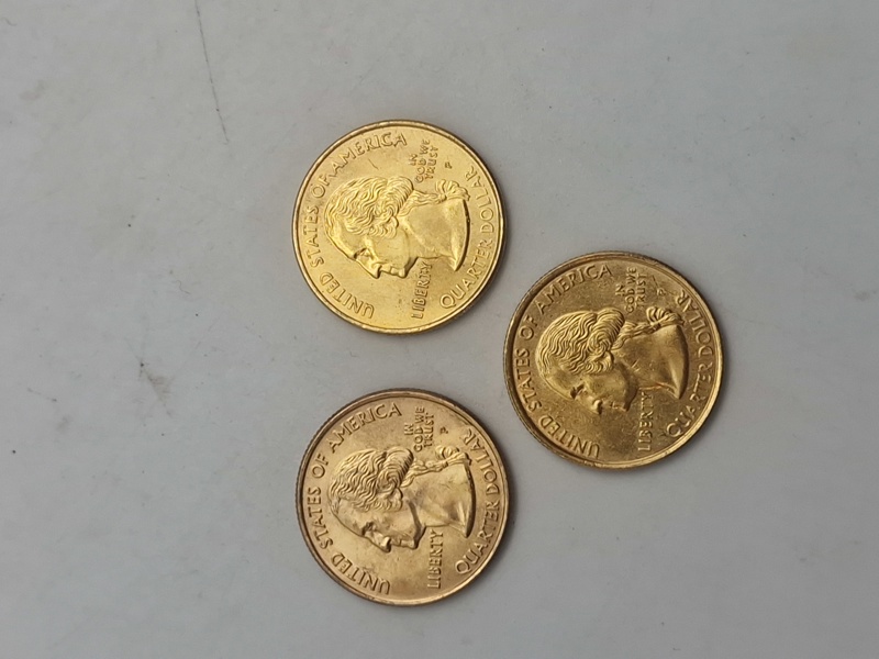 3 forgyldte mønter quarter dollars