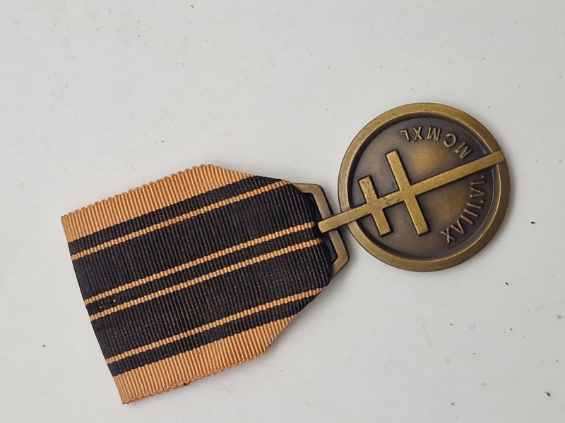 den franske modstandsmedalje, kendt som Médaille de la Résistance. Denne medalje blev oprettet af den franske komité for national befrielse under Anden Verdenskrig og tildelt af General de Gaulle 