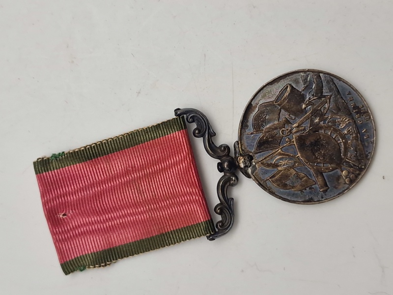 Original Tyrkisk Krimmedalje, en kampagnemedalje udstedt af Sultan Abdulmejid I af Det Osmanniske Rige til allieret militærpersonel, der deltog i Krimkrigen (1854-1856). 