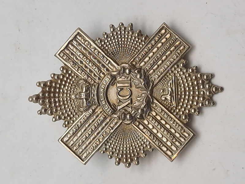 regimentsmærkeWW1/WW2  for The Gordon Highlanders, et tidligere infanteriregiment i den britiske hær.