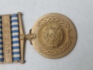 De Forenede Nationers Koreamedalje (United Nations Service Medal for Korea – UNSMK). 