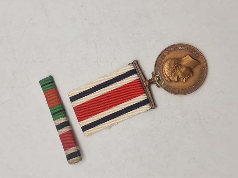 Original “Special Constabulary Long Service Medal". med navn 