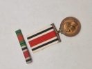 Original “Special Constabulary Long Service Medal". med navn 
