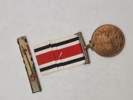 Original “Special Constabulary Long Service Medal". med navn 