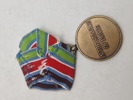 Original FN-medalje, som er en international dekoration tildelt af De Forenede Nationer (FN) til militært og politimæssigt personale, der har deltaget i FN-operationer. 