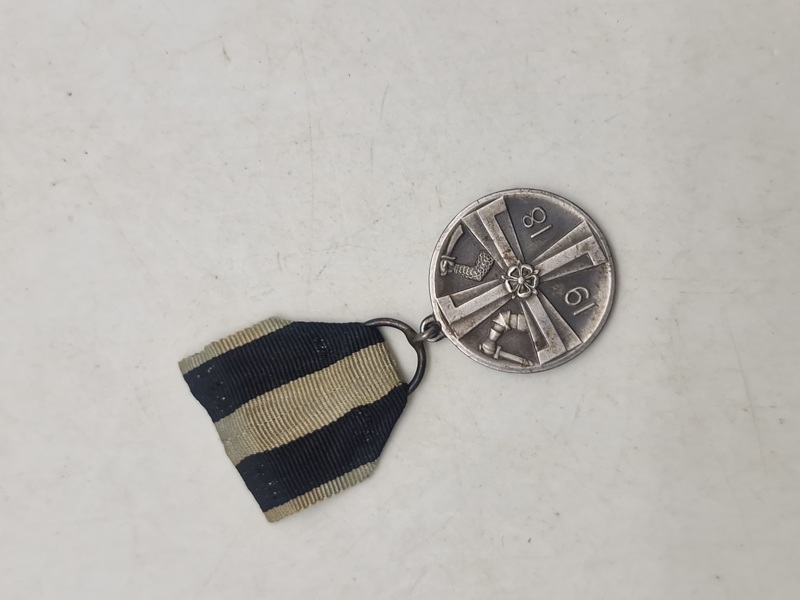 Original finsk mindemedalje for Frihedskrigen (Vapaussodan muistomitali), som blev indstiftet den 10. september 1918 af det finske senat. 
