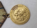 Medaljen "Partisan i Fædrelandskrigen" af 2. klasse, en sovjetisk medalje fra 1940'erne. 