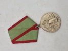 medaljen "For udmærkelse i forsvaret af USSR's statsgrænse" (også kendt som "Medal for Distinction in Guarding the State Border of the USSR"). 