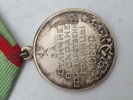 medaljen "For udmærkelse i forsvaret af USSR's statsgrænse" (også kendt som "Medal for Distinction in Guarding the State Border of the USSR"). 