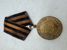 Original medalje "For sejren over Tyskland i Den Store Fædrelandskrig 1941-1945". 
