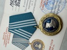 Original sovjetisk jubilæumsmedalje, "Admiral af Sovjetunionens Flåde Kuznetsov", og et tilhørende dokument