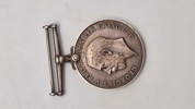 Original Britisk Krigsmedalje (British War Medal), en kampagnemedalje fra Storbritannien, der blev tildelt for tjeneste i Første Verdenskrig - Navngiven 