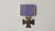 Originalt Brunswick Krigsfortjenestekorset (Braunschweigisches Kriegsverdienstkreuz), også kendt som Ernst-August-Korset.