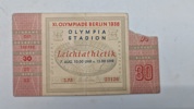 Original billet til De XI Olympiske Lege i Berlin i 1936. 
Billetten er til atletikbegivenheder i Olympiastadion den 7. august, kl. 10.00 og 15.00. 
