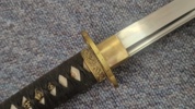 Veludført japansk katana med Damaskus klinge  