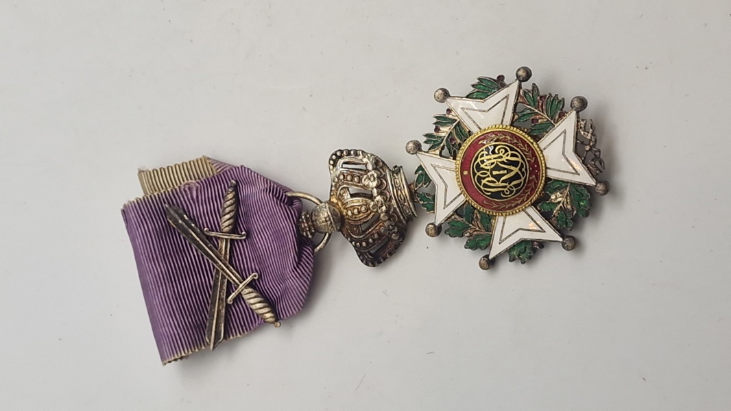 Original belgiske Leopoldorden, som er den ældste og mest prestigefyldte af de tre nationale belgiske ridderordener.