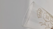 Originalt snapseglas, reijmyre med Gustav III's monogram. 20. århundrede.