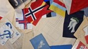 Samling bordflag flag, bannere mm. fra nedlagt Dansk flagfabrik 