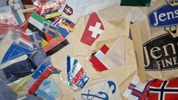 Samling bordflag flag, bannere mm. fra nedlagt Dansk flagfabrik 
