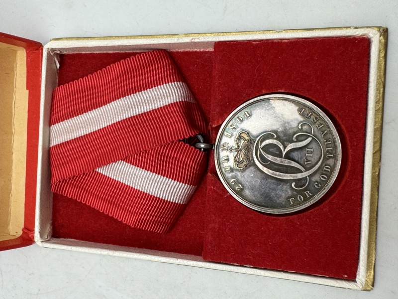 Originalt eks. af Hæderstegnet for god tjeneste ved Søetaten, også kendt som Holmens Hæderstegn