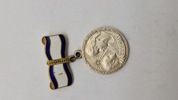 Original sovjetisk medalje kendt som 'Medal of Motherhood' (Medal' za materinstvo)