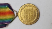 Original amerikansk sejrsmedalje fra Første Verdenskrig (World War I Victory Medal). Navngiven