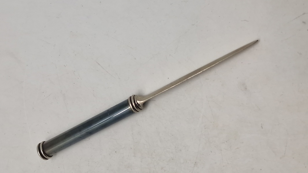 Veludført brevåbner