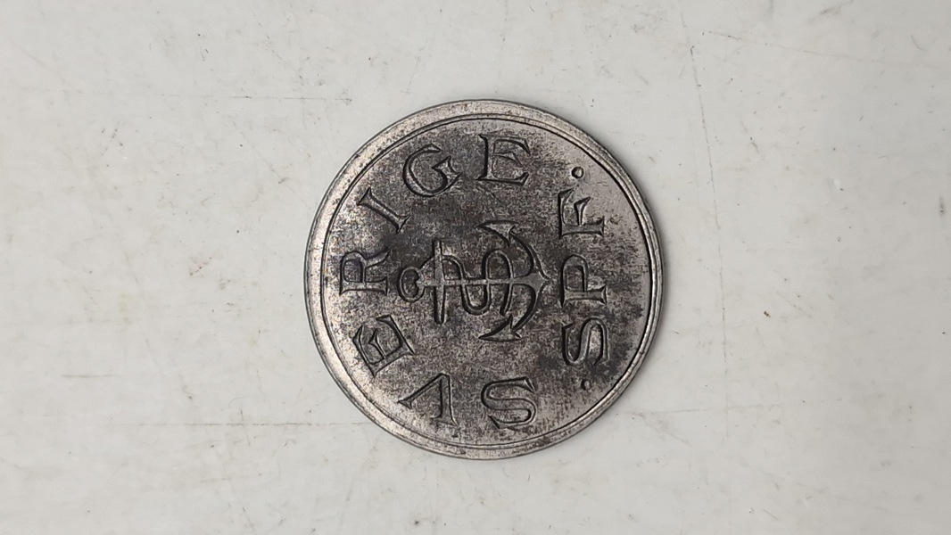 Original mindemedalje for panserskibet Sverige, præget i materiale fra skibets panserplader