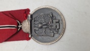 Original Medaille „Winterschlacht im Osten 1941/42“)