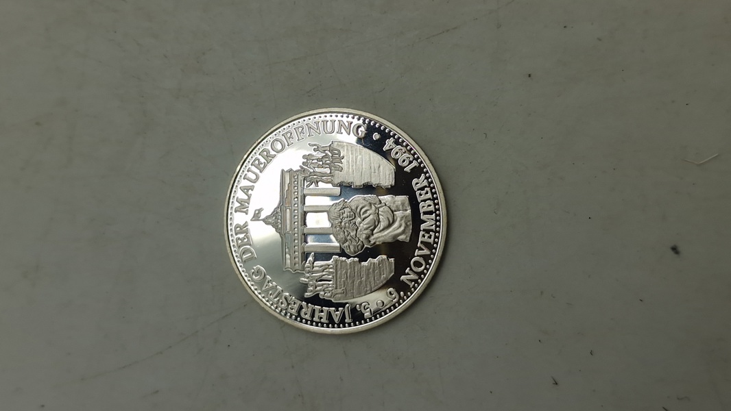 Tysk mønt, der markerer 5-årsdagen for Murens fald. Sølv