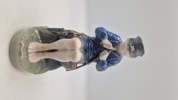Royal Copenhagen-figur nr. 905, også kendt som "Hyrdedreng der snitter i gren" eller "The Whittler"