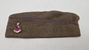 Distinctive Unit (DUI) fra Adjutant General's School side cap. Original 