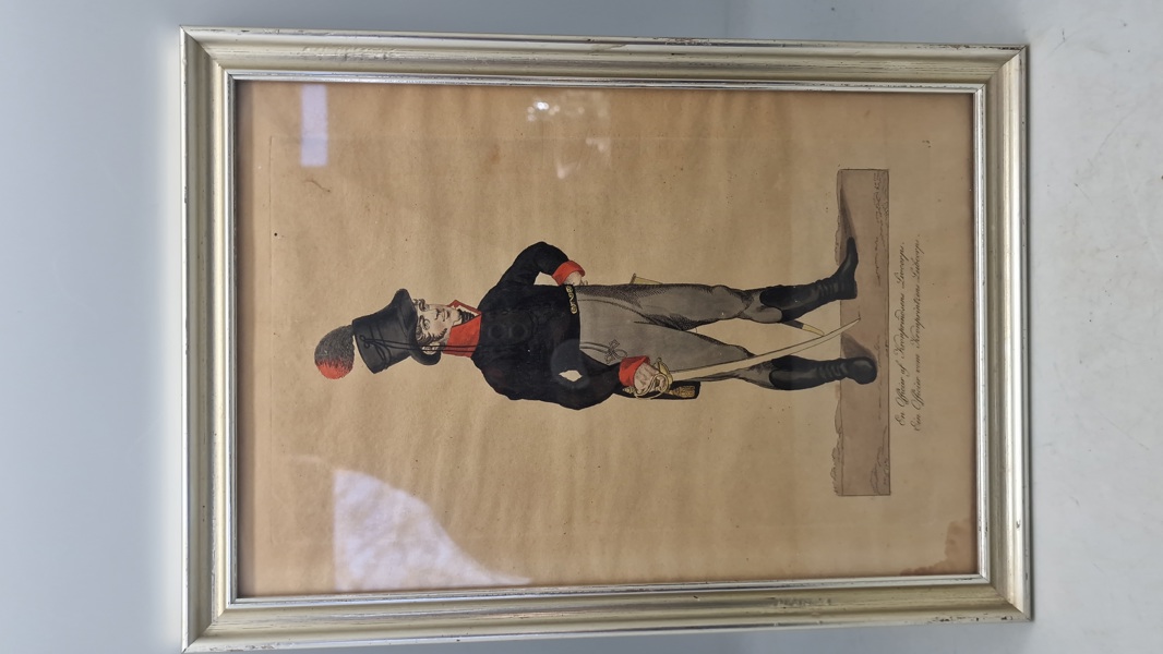 farvelagt litografi med teksten "En Officier af Kronprindsens Livcorps." og "Ein Officier vom Kronprintzene Leibcorp."