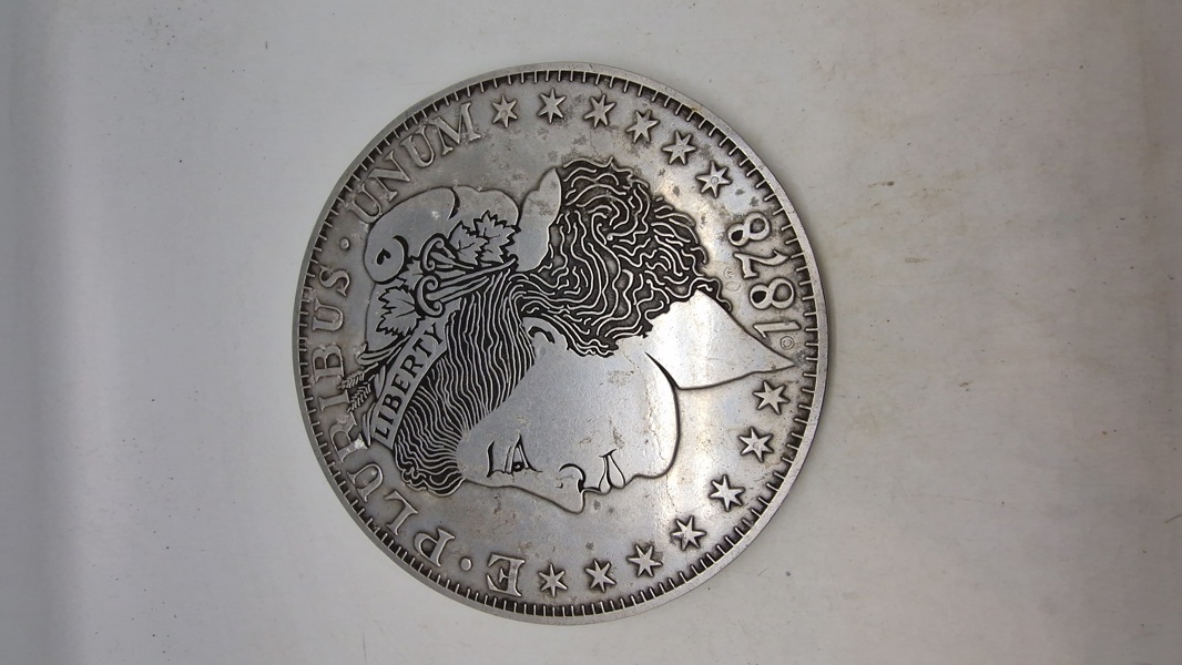 Skilt lavet som amerikansk mønt 