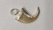 Sølvbeslået klo lavet som halssmykke 