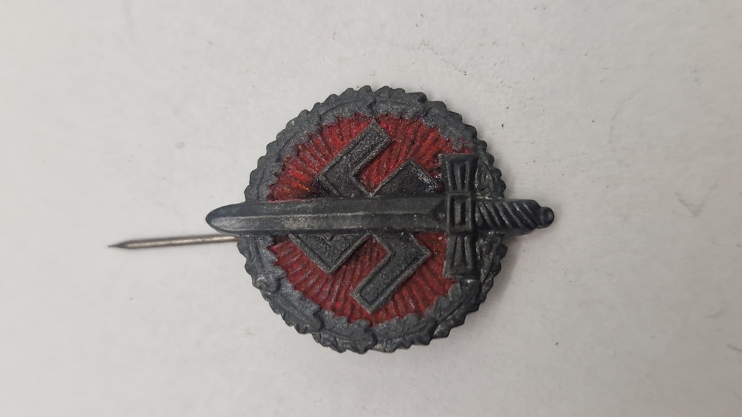 Nationalsozialistische Kriegsopferversorgung (NSKOV) tinnie. Original