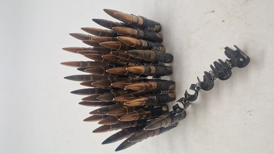 Bælte til mg/34/42 fra ww2 med deaktivererede patroner. Originalt