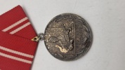 Tysk Medaille für treue Dienste in den Kampfgruppen der Arbeiterklasse" fra DDR. Original 
