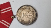 Tysk Medaille für treue Dienste in den Kampfgruppen der Arbeiterklasse" fra DDR. Original 