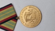 Tysk Medalje for Tjenesteloyalitet i den Nationale Folkearmé (NVA). Original 