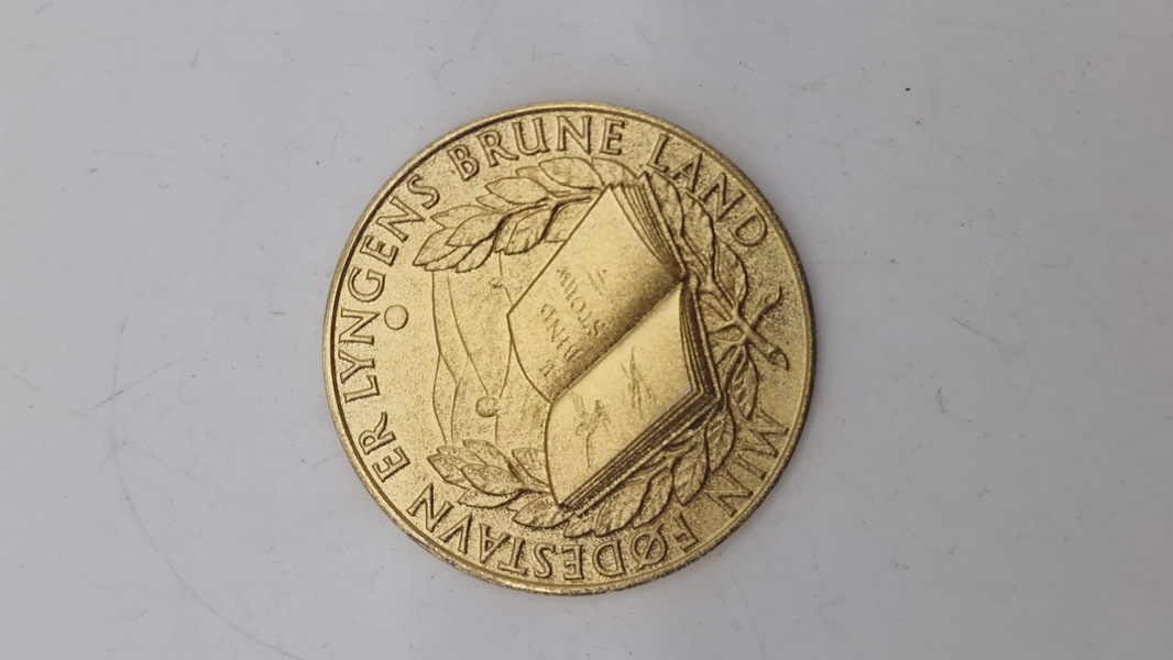 Dansk bronzemedalje med et portræt af den danske forfatter og præst Steen Steensen Blicher