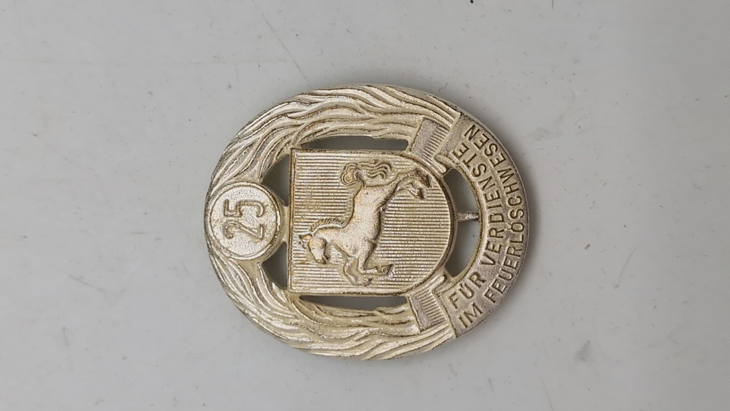 Tysk Feuerwehr-Ehrenzeichen (brandvæsenets ærestitel) fra delstaten Niedersachsen.  Original 
