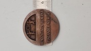 Finsk bronzemedalje fra 1946 med titlen “Benignitatis Humanae Finlandia Memor”.